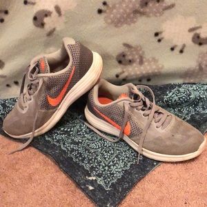 Pair of grey and pink nike